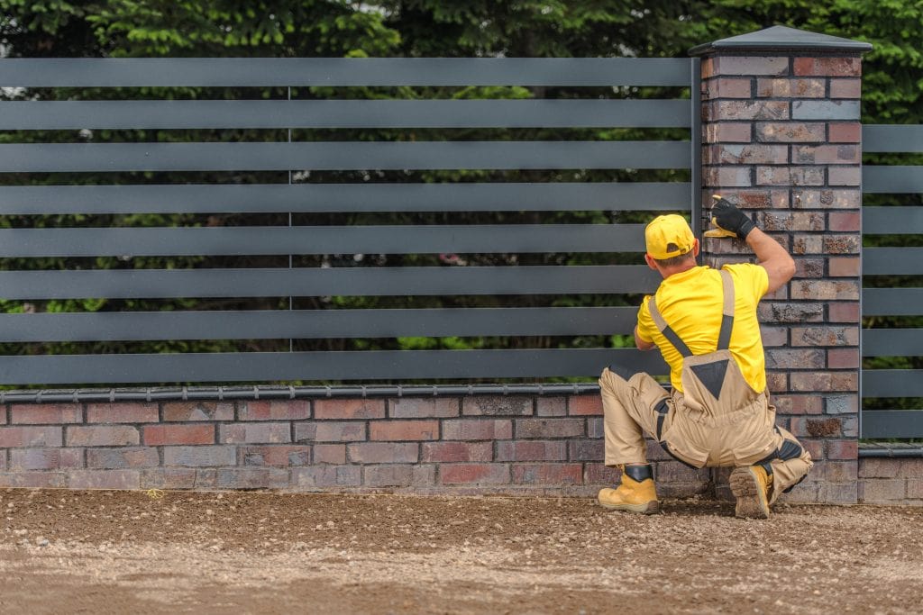 retaining wall with fence