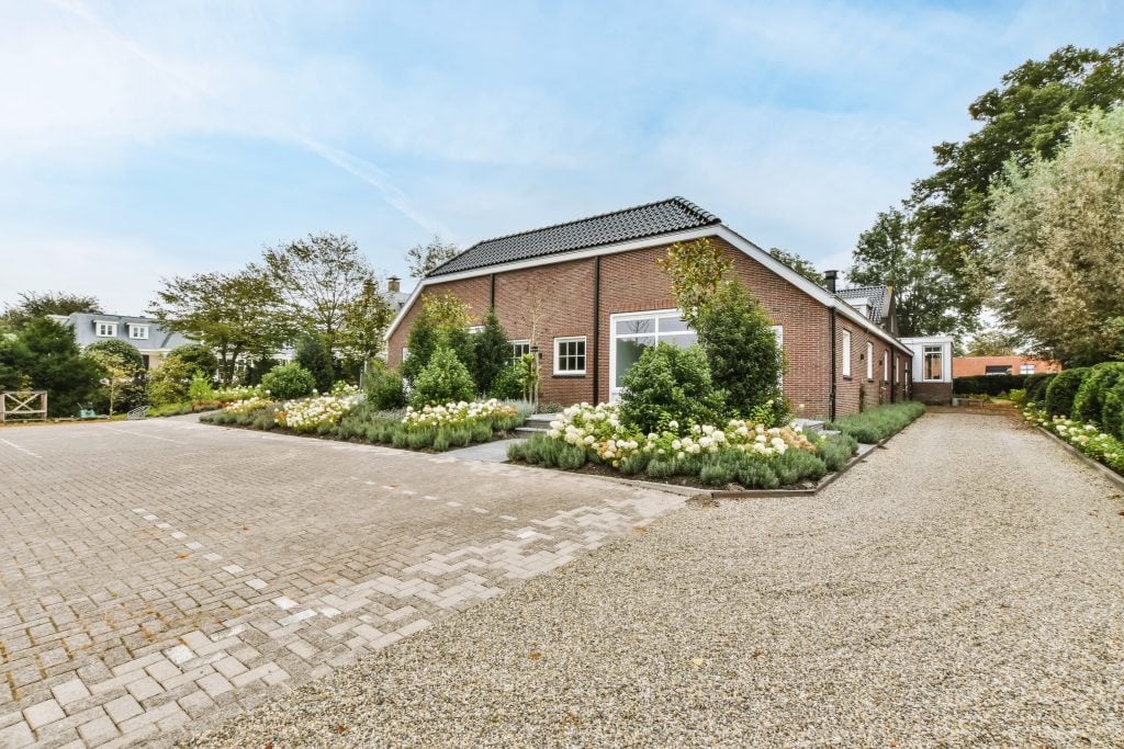 modern exposed aggregate concrete driveway